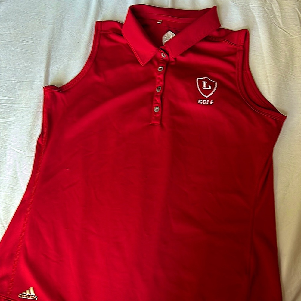 A red golf shirt from Adidas size small.